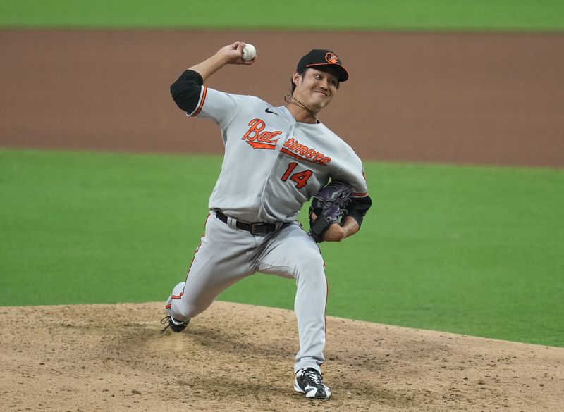 Aug 16, 2023; San Diego, California, USA;  Baltimore Orioles relief pitcher Shintaro Fujinami (14) throws a pitch against the San Diego Padres during the seventh inning at Petco Park. Mandatory Credit: Ray Acevedo-USA TODAY Sports