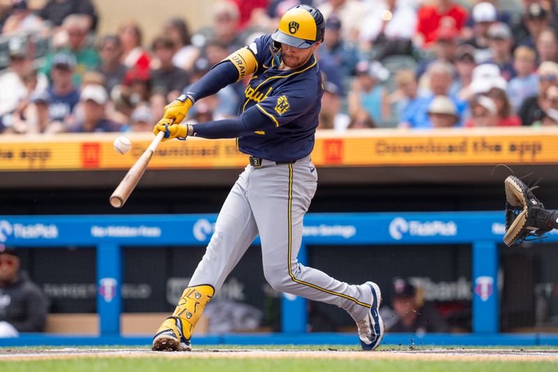 Jul 21, 2024; Minneapolis, Minnesota, USA; Milwaukee Brewers second base Brice Turang (2) leads off with a fly out to Minnesota Twins right field Max Kepler (26) in the first inning at Target Field. Mandatory Credit: Matt Blewett-USA TODAY Sports