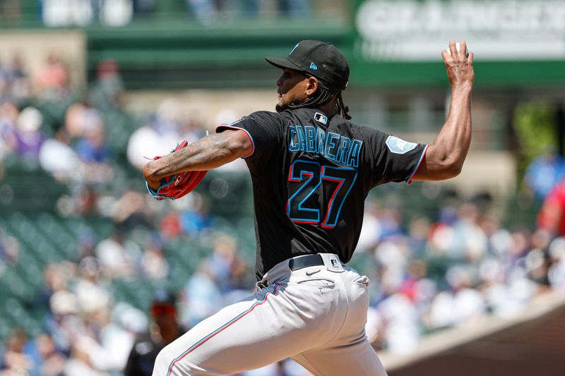 May 5, 2023; Chicago, Illinois, USA; Miami Marlins starting pitcher Edward Cabrera (27) pitches against the Chicago Cubs during the first inning at Wrigley Field. Mandatory Credit: Kamil Krzaczynski-USA TODAY Sports