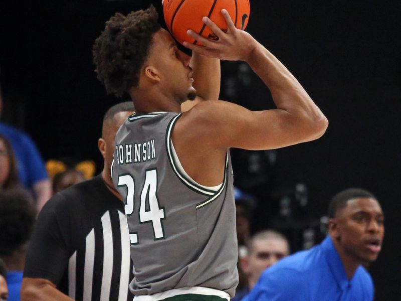 Mar 3, 2024; Memphis, Tennessee, USA; UAB Blazers guard Efrem Johnson (24) attempts a three point basket during the first half against the Memphis Tigers at FedExForum. Mandatory Credit: Petre Thomas-USA TODAY Sports