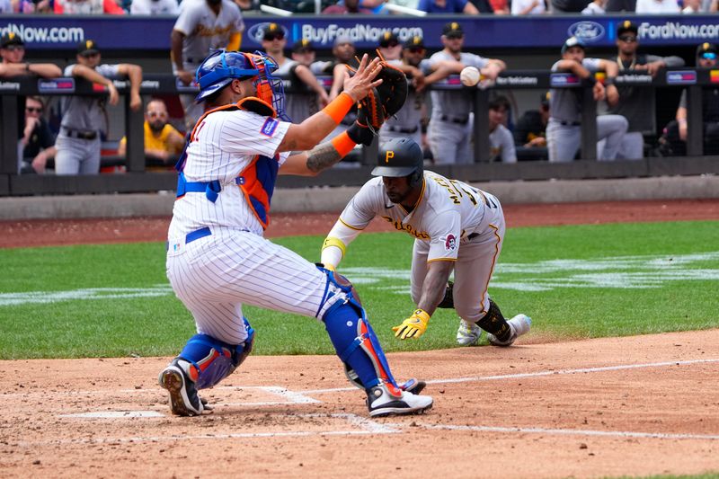 Aug 16, 2023; New York City, New York, USA; New York Mets catcher Omar Narvaez (2) tags out Pittsburgh Pirates designated hitter Andrew McCutchen (22) attempting to score a run on Pittsburgh Pirates center fielder Jack Suwinski (65) double during the fifth inning at Citi Field. Mandatory Credit: Gregory Fisher-USA TODAY Sports