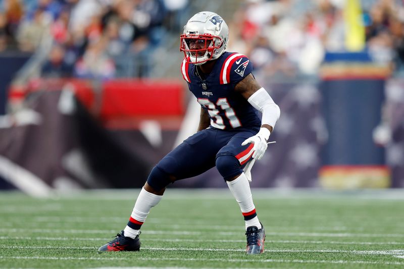 New England Patriots cornerback Jonathan Jones (31) plays against the Washington Commanders in the second half of an NFL football game, Sunday, Nov. 5, 2023, in Foxborough, Mass. (AP Photo/Michael Dwyer)