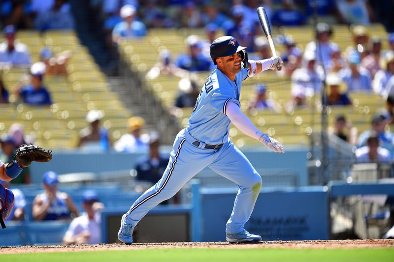 Jul 26, 2023; Los Angeles, California, USA; Toronto Blue Jays left fielder Whit Merrifield (15) hits a single against the Los Angeles Dodgers during the eighth inning at Dodger Stadium. Mandatory Credit: Gary A. Vasquez-USA TODAY Sports