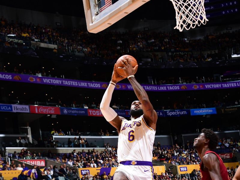 LOS ANGELES, CA - NOVEMBER 6: LeBron James #6 of the Los Angeles Lakers drives to the basket during the game against the Cleveland Cavaliers on November 6, 2022 at Crypto.Com Arena in Los Angeles, California. NOTE TO USER: User expressly acknowledges and agrees that, by downloading and/or using this Photograph, user is consenting to the terms and conditions of the Getty Images License Agreement. Mandatory Copyright Notice: Copyright 2022 NBAE (Photo by Adam Pantozzi/NBAE via Getty Images)