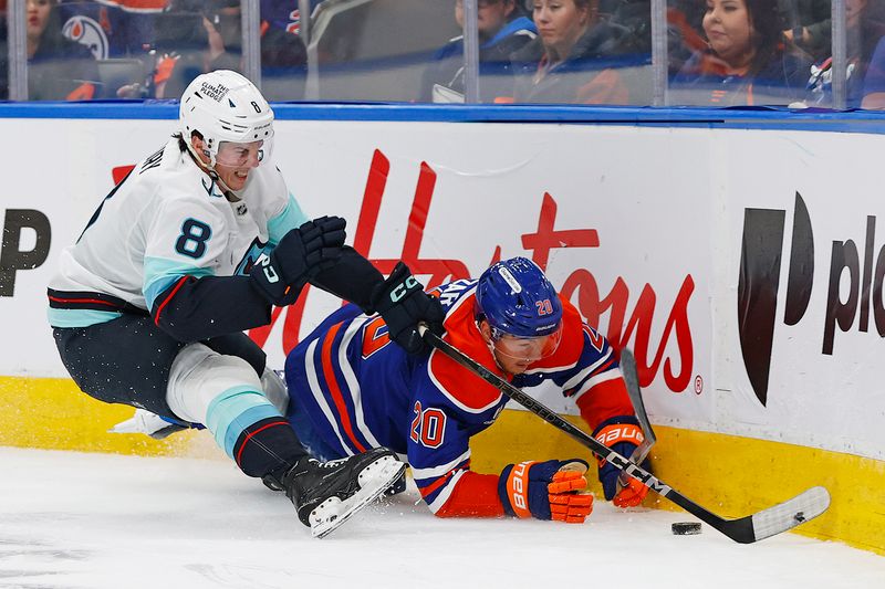 Sep 24, 2025; Edmonton, Alberta, CAN; Seattle Kraken defensemen Cale Fleury (8) and Edmonton Oilers forward Curtis Lazar (20) crash into the boards while battling for a loose puck during the first period at Rogers Place. Mandatory Credit: Perry Nelson-Imagn Images