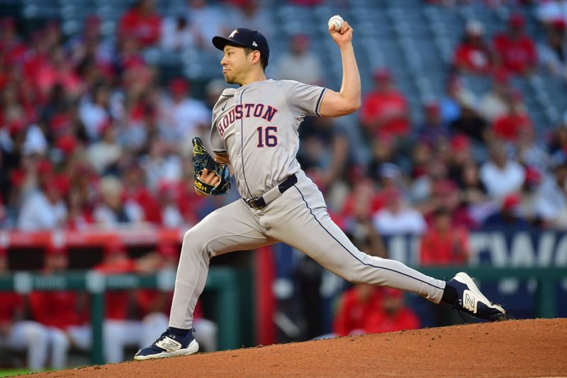 Sep 13, 2024; Anaheim, California, USA; Houston Astros pitcher Yusei Kikuchi (16) throws against the Los Angeles Angels during the first inning at Angel Stadium. Mandatory Credit: Gary A. Vasquez-Imagn Images