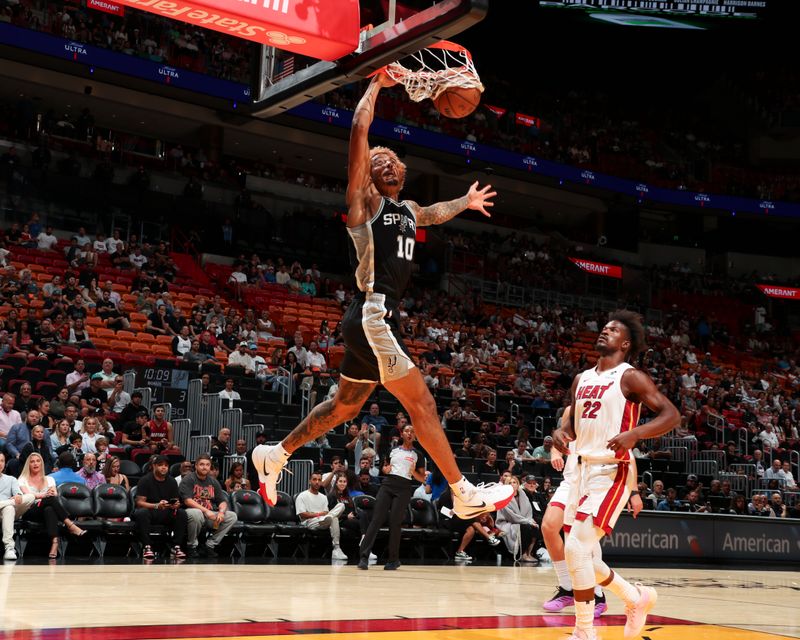 MIAMI, FL - OCTOBER 15: Jeremy Sochan #10 of the San Antonio Spurs dunks the ball during the game on October 15, 2024 at Kaseya Center in Miami, Florida. NOTE TO USER: User expressly acknowledges and agrees that, by downloading and or using this Photograph, user is consenting to the terms and conditions of the Getty Images License Agreement. Mandatory Copyright Notice: Copyright 2024 NBAE (Photo by Issac Baldizon/NBAE via Getty Images)