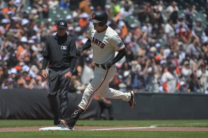 Jun 7, 2025; San Francisco, California, USA;  San Francisco Giants first baseman Wilmer Flores (41) rounds the bases after hitting a home run against the Atlanta Braves during the fourth inning at Oracle Park. Mandatory Credit: Ed Szczepanski-Imagn Images