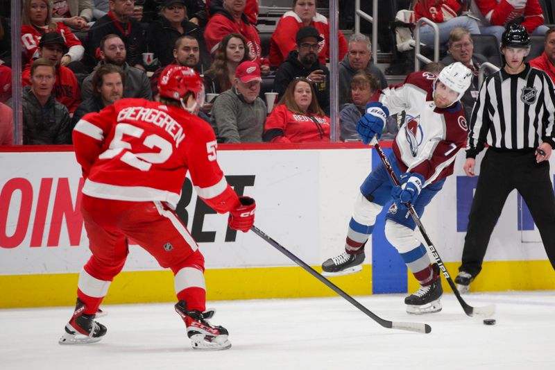 Mar 18, 2023; Detroit, Michigan, USA; Colorado Avalanche defenseman Devon Toews (7) handles the puck against the Detroit Red Wings during the third period at Little Caesars Arena. Mandatory Credit: Brian Bradshaw Sevald-USA TODAY Sports