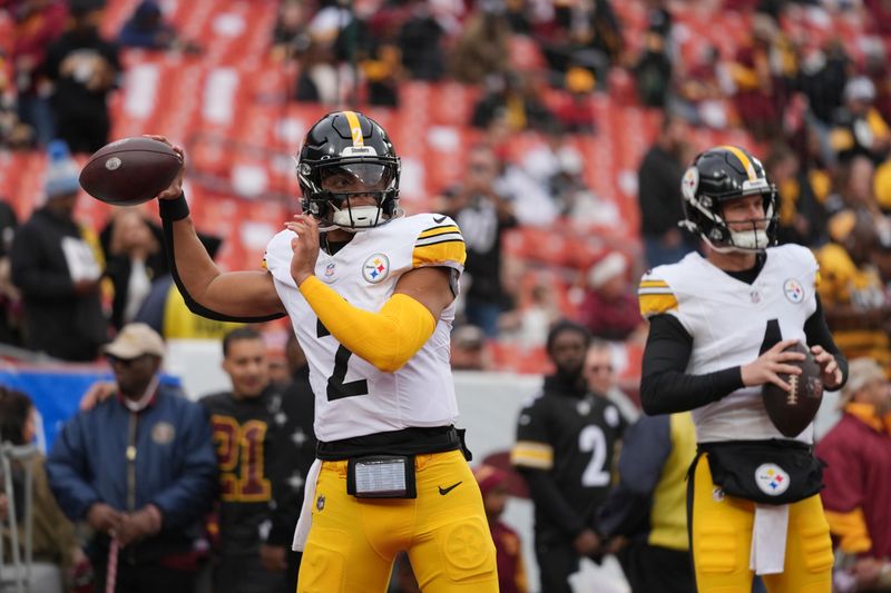 Pittsburgh Steelers quarterback Justin Fields throws during pregame of an NFL football game against the Washington Commanders, Sunday, Nov. 10, 2024, in Landover, Md. (AP Photo/Stephanie Scarbrough)