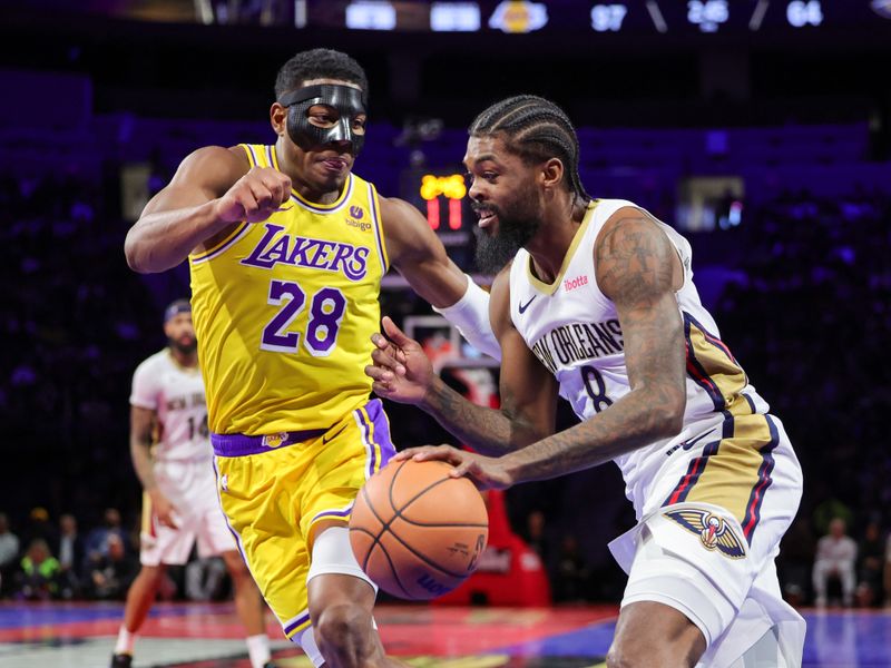 LAS VEGAS, NEVADA - DECEMBER 07: Naji Marshall #8 of the New Orleans Pelicans drives against Rui Hachimura #28 of the Los Angeles Lakers in the second half of the West semifinal game of the inaugural NBA In-Season Tournament at T-Mobile Arena on December 07, 2023 in Las Vegas, Nevada. The Lakers defeated the Pelicans 133-89. NOTE TO USER: User expressly acknowledges and agrees that, by downloading and or using this photograph, User is consenting to the terms and conditions of the Getty Images License Agreement. (Photo by Ethan Miller/Getty Images)