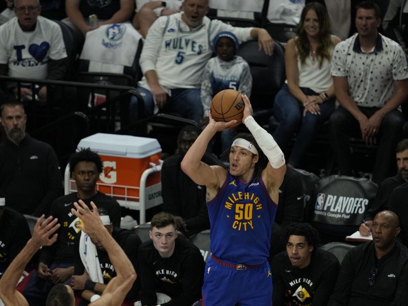 MINNEAPOLIS, MN -  MAY 16: Aaron Gordon #50 of the Denver Nuggets shoots a three point basket during the game against the Minnesota Timberwolves during Round 2 Game 6 of the 2024 NBA Playoffs on May 16, 2024 at Target Center in Minneapolis, Minnesota. NOTE TO USER: User expressly acknowledges and agrees that, by downloading and or using this Photograph, user is consenting to the terms and conditions of the Getty Images License Agreement. Mandatory Copyright Notice: Copyright 2024 NBAE (Photo by Jordan Johnson/NBAE via Getty Images)