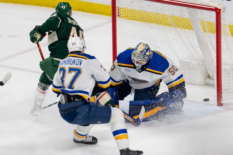 Apr 8, 2023; Saint Paul, Minnesota, USA; Minnesota Wild defenseman Jared Spurgeon (46) scores on St. Louis Blues goaltender Jordan Binnington (50) in the second period at Xcel Energy Center. Mandatory Credit: Matt Blewett-USA TODAY Sports