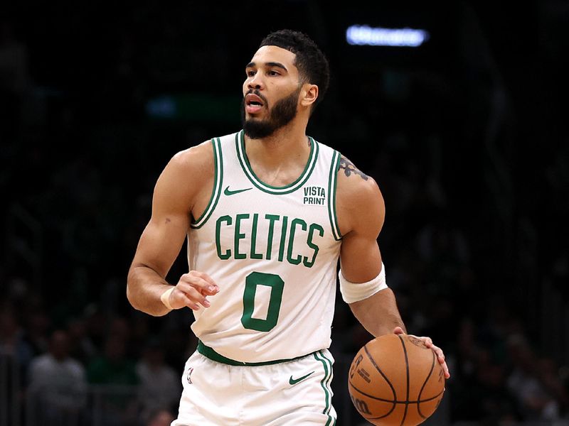 BOSTON, MASSACHUSETTS - JANUARY 05: Jayson Tatum #0 of the Boston Celtics dribbles downcourt against the Utah Jazz during the first quarter at TD Garden on January 05, 2024 in Boston, Massachusetts. NOTE TO USER: User expressly acknowledges and agrees that, by downloading and or using this photograph, user is consenting to the terms and conditions of the Getty Images License Agreement.  (Photo by Maddie Meyer/Getty Images)