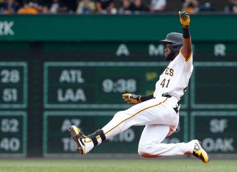 Aug 17, 2024; Pittsburgh, Pennsylvania, USA;  Pittsburgh Pirates left fielder Bryan De La Cruz (41) runs to second base after hitting a single and a Seattle Mariners error during the sixth inning at PNC Park. Mandatory Credit: Charles LeClaire-USA TODAY Sports