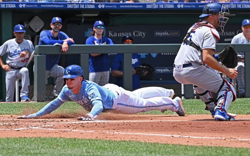 Jul 2, 2023; Kansas City, Missouri, USA;  Kansas City Royals right fielder Drew Waters (6) scores a run against Los Angeles Dodgers catcher Austin Barnes (15) in the second inning at Kauffman Stadium. Mandatory Credit: Peter Aiken-USA TODAY Sports