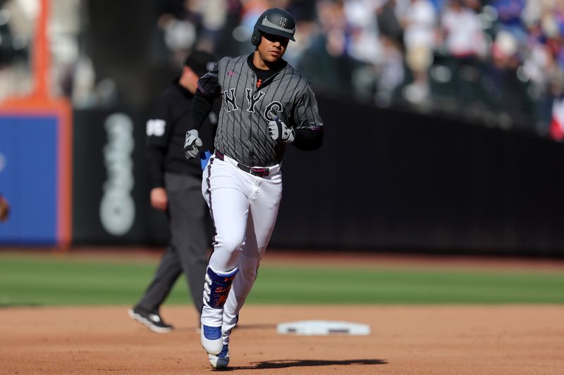 May 31, 2025; New York City, New York, USA; New York Mets right fielder Juan Soto (22) rounds the bases after hitting a solo home run against the Colorado Rockies during the fourth inning at Citi Field. Mandatory Credit: Brad Penner-Imagn Images