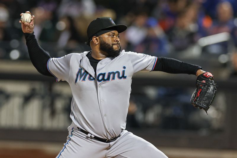 Sep 27, 2023; New York, NY, USA; Miami Marlins starting pitcher Johnny Cueto (47) delivers a pitch during the first inning against the New York Mets at Citi Field.  Mandatory Credit: Vincent Carchietta-USA TODAY Sports