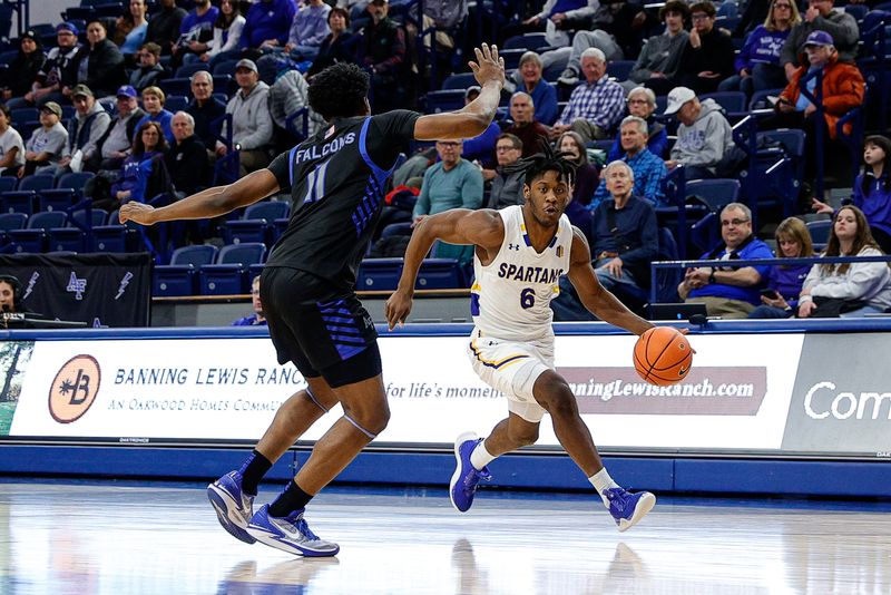 Jan 13, 2024; Colorado Springs, Colorado, USA; San Jose State Spartans guard Latrell Davis (6) drives to the basket against Air Force Falcons guard Byron Brown (11) in the first half at Clune Arena. Mandatory Credit: Isaiah J. Downing-USA TODAY Sports