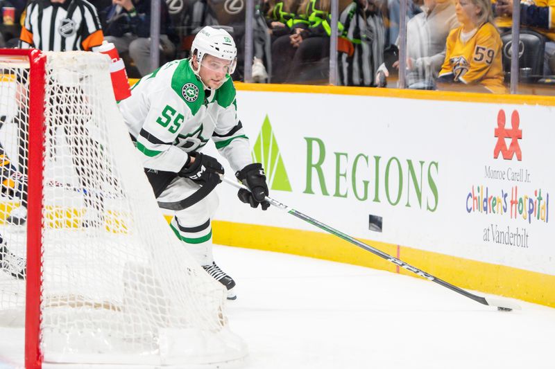 Feb 15, 2024; Nashville, Tennessee, USA; Dallas Stars defenseman Thomas Harley (55) skates with the puck  against the Nashville Predators during the second period at Bridgestone Arena. Mandatory Credit: Steve Roberts-USA TODAY Sports