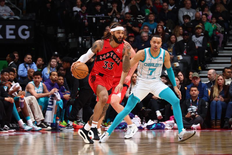 TORONTO, CANADA - MARCH 3: Gary Trent Jr. #33 of the Toronto Raptors dribbles the ball during the game against the Charlotte Hornets on March 3, 2024 at the Scotiabank Arena in Toronto, Ontario, Canada.  NOTE TO USER: User expressly acknowledges and agrees that, by downloading and or using this Photograph, user is consenting to the terms and conditions of the Getty Images License Agreement.  Mandatory Copyright Notice: Copyright 2024 NBAE (Photo by Vaughn Ridley/NBAE via Getty Images)