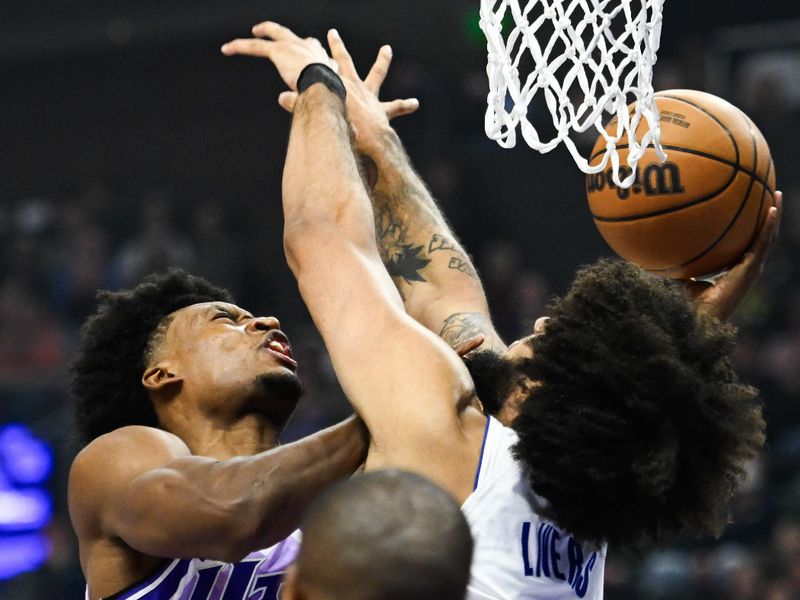 SALT LAKE CITY, UTAH - JANUARY 03: Collin Sexton #2 of the Utah Jazz shoots against Isaiah Livers #12 of the Detroit Pistons during the first half of a game at Delta Center on January 03, 2024 in Salt Lake City, Utah. NOTE TO USER: User expressly acknowledges and agrees that, by downloading and or using this photograph, User is consenting to the terms and conditions of the Getty Images License Agreement. (Photo by Alex Goodlett/Getty Images)