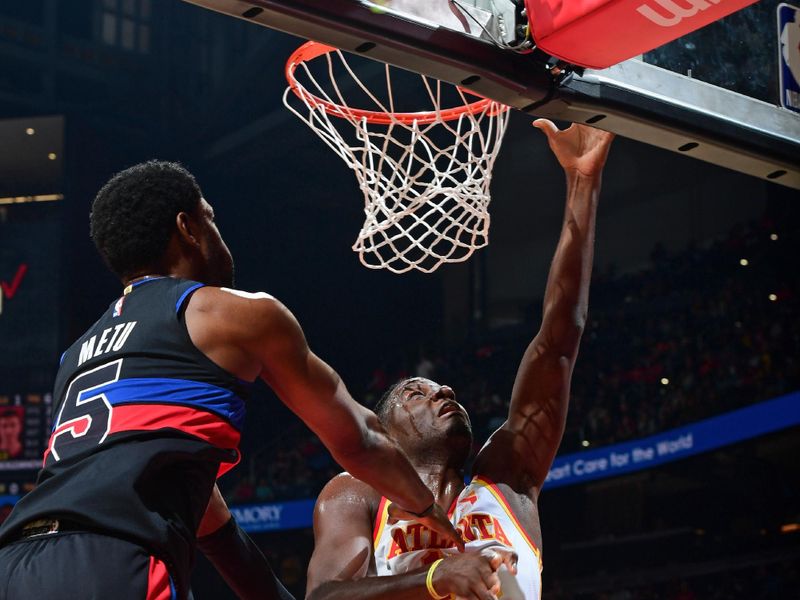 ATLANTA, GA - APRIL 3: Clint Capela #15 of the Atlanta Hawks drives to the basket during the game against the Detroit Pistons on April 3, 2024 at State Farm Arena in Atlanta, Georgia.  NOTE TO USER: User expressly acknowledges and agrees that, by downloading and/or using this Photograph, user is consenting to the terms and conditions of the Getty Images License Agreement. Mandatory Copyright Notice: Copyright 2024 NBAE (Photo by Scott Cunningham/NBAE via Getty Images)