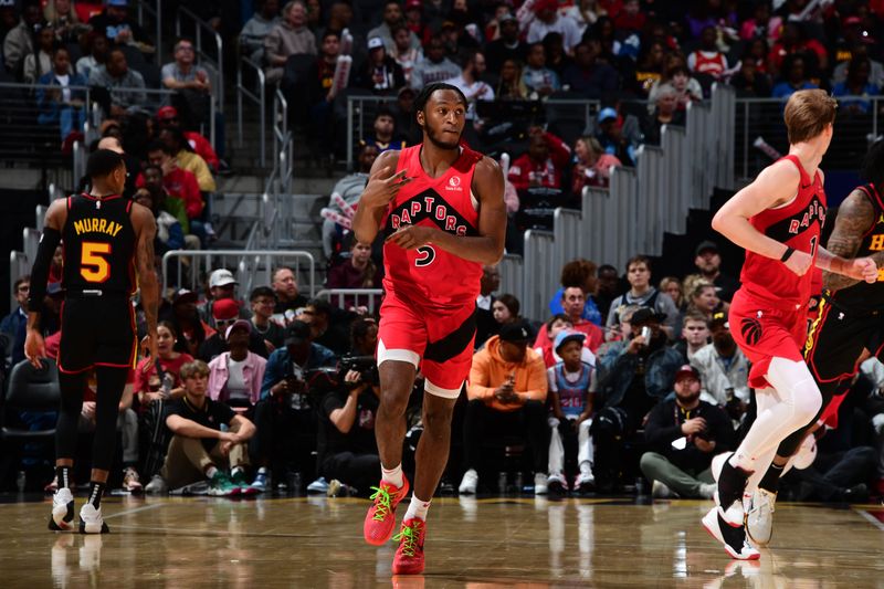 ATLANTA, GA - February 23:  Immanuel Quickley #5 of the Toronto Raptors reacts during the game against the Atlanta Hawks on February 23, 2024 at State Farm Arena in Atlanta, Georgia.  NOTE TO USER: User expressly acknowledges and agrees that, by downloading and/or using this Photograph, user is consenting to the terms and conditions of the Getty Images License Agreement. Mandatory Copyright Notice: Copyright 2024 NBAE (Photo by Scott Cunningham/NBAE via Getty Images)