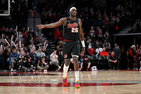 PORTLAND, OREGON - DECEMBER 14: Duop Reath #26 of the Portland Trail Blazers gestures after making a three point basket during the fourth quarter of the game against the Utah Jazz at Moda Center on December 14, 2023 in Portland, Oregon. The Utah Jazz won 122-114. NOTE TO USER: User expressly acknowledges and agrees that, by downloading and or using this Photograph, user is consenting to the terms and conditions of the Getty Images License Agreement. (Photo by Alika Jenner/Getty Images)