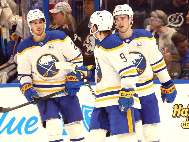 Apr 15, 2024; Tampa, Florida, USA;  Buffalo Sabres left wing Zach Benson (9) celebrates after he scored a goal against the Tampa Bay Lightning during the third period at Amalie Arena. Mandatory Credit: Kim Klement Neitzel-USA TODAY Sports