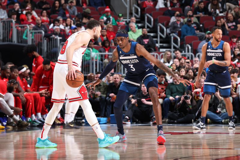 CHICAGO, IL - MARCH 17: Jaden McDaniels #3 of the Minnesota Timberwolves plays defense during the game against the Chicago Bulls on March 17, 2023 at United Center in Chicago, Illinois. NOTE TO USER: User expressly acknowledges and agrees that, by downloading and or using this photograph, User is consenting to the terms and conditions of the Getty Images License Agreement. Mandatory Copyright Notice: Copyright 2023 NBAE (Photo by Jeff Haynes/NBAE via Getty Images)