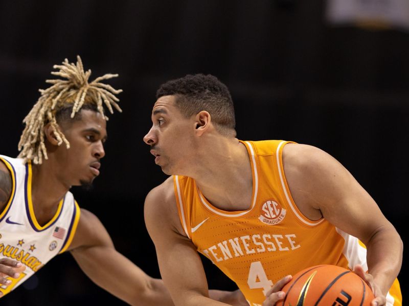 Jan 21, 2023; Baton Rouge, Louisiana, USA;  Tennessee Volunteers guard Tyreke Key (4) controls the ball against LSU Tigers guard Adam Miller (44) during the second half at Pete Maravich Assembly Center. Mandatory Credit: Stephen Lew-USA TODAY Sports