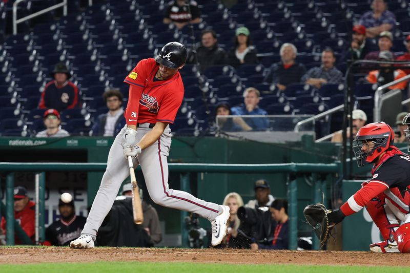 Sep 16, 2025; Washington, District of Columbia, USA; Atlanta Braves first base Matt Olson (28) hits a three run triple against the Washington Nationals during the tenth inning at Nationals Park. Mandatory Credit: Geoff Burke-Imagn Images