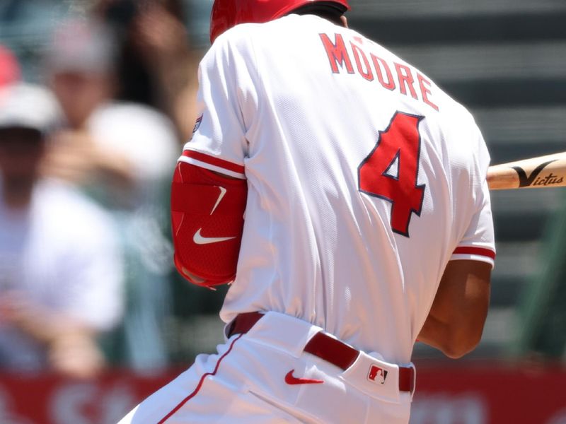Jun 25, 2025; Anaheim, California, USA;  Los Angeles Angels second baseman Christian Moore (4) is hit by a pitch during the first inning against the Boston Red Sox at Angel Stadium. Mandatory Credit: Kiyoshi Mio-Imagn Images
