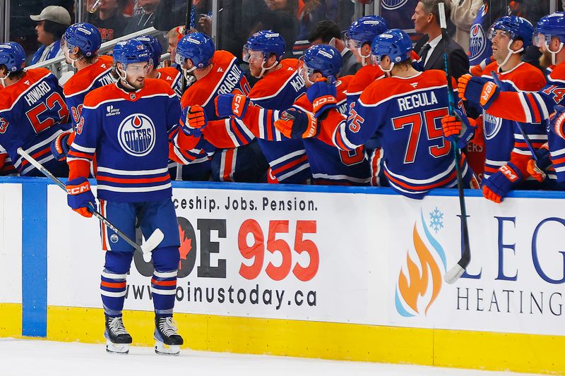 Oct 11, 2025; Edmonton, Alberta, CAN; The Edmonton Oilers celebrate a goal scored by forward Noah Philp (48), his first goal in the NHL, during the second period against the Vancouver Canucks at Rogers Place. Mandatory Credit: Perry Nelson-Imagn Images