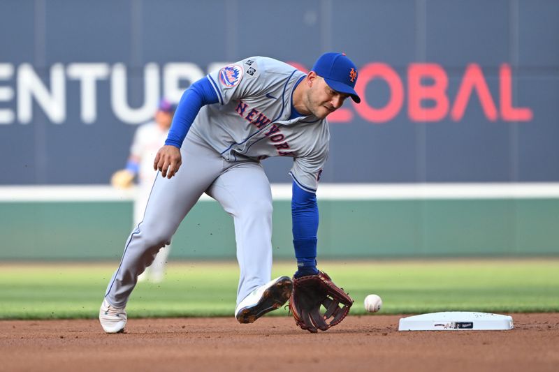 Jul 3, 2024; Washington, District of Columbia, USA; New York Mets second baseman Jose Iglesias (11) fields a ground ball against the Washington Nationals during the first inning at Nationals Park. Mandatory Credit: Rafael Suanes-USA TODAY Sports