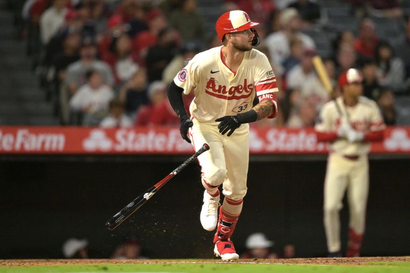 Sep 16, 2024; Anaheim, California, USA;  Los Angeles Angels second baseman Charles Leblanc (33) hits a solo home run in the fifth inning against the Chicago White Sox at Angel Stadium. Mandatory Credit: Jayne Kamin-Oncea-Imagn Images