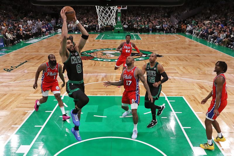 BOSTON, MASSACHUSETTS - MAY 01: Jayson Tatum #0 of the Boston Celtics takes a shot against the Philadelphia 76ers during the second half in game one of the Eastern Conference Second Round Playoffs  at TD Garden on May 01, 2023 in Boston, Massachusetts. NOTE TO USER: User expressly acknowledges and agrees that, by downloading and or using this photograph, User is consenting to the terms and conditions of the Getty Images License Agreement.  (Photo by Maddie Meyer/Getty Images)