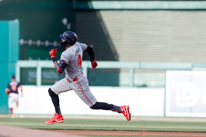 May 21, 2024; Washington, District of Columbia, USA; Minnesota Twins shortstop Carlos Correa (4) runs the bases after hitting a triple against the Washington Nationals during the first inning at Nationals Park. Mandatory Credit: Geoff Burke-USA TODAY Sports