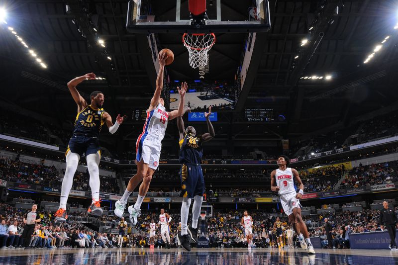 INDIANAPOLIS, IN - FEBRUARY 22:  Simone Fontecchio #19 of the Detroit Pistons goes to the basket during the game on February 22, 2024 at Gainbridge Fieldhouse in Indianapolis, Indiana. NOTE TO USER: User expressly acknowledges and agrees that, by downloading and or using this Photograph, user is consenting to the terms and conditions of the Getty Images License Agreement. Mandatory Copyright Notice: Copyright 2024 NBAE (Photo by Ron Hoskins/NBAE via Getty Images)