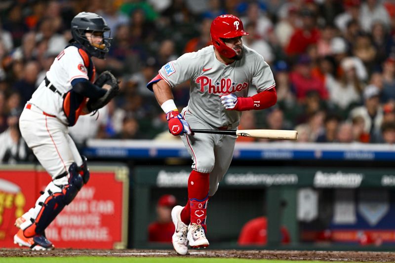 Jun 25, 2025; Houston, Texas, USA; Philadelphia Phillies left fielder Kyle Schwarber (12)runs up the first base line during in the eighth inning against the Houston Astros at Daikin Park. Mandatory Credit: Maria Lysaker-Imagn Images 