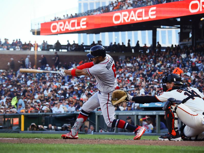 Aug 27, 2023; San Francisco, California, USA; Atlanta Braves left fielder Eddie Rosario (8) hits a double against the San Francisco Giants during the fifth inning at Oracle Park. Mandatory Credit: Kelley L Cox-USA TODAY Sports