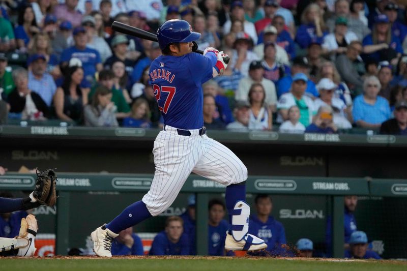 Mar 12, 2024; Mesa, Arizona, USA; Chicago Cubs right fielder Seiya Suzuki (27) hits against the Milwaukee Brewers in the first inning at Sloan Park. Mandatory Credit: Rick Scuteri-USA TODAY Sports