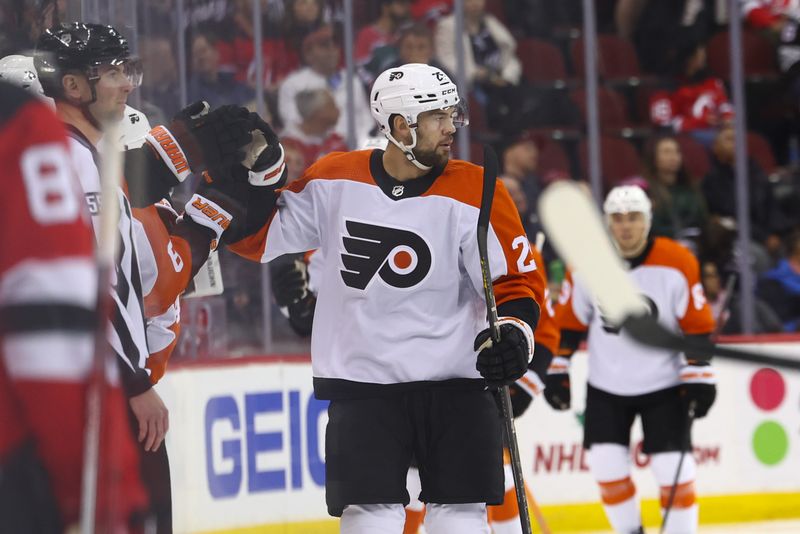 Dec 19, 2023; Newark, New Jersey, USA; Philadelphia Flyers center Ryan Poehling (25) celebrates his goal against the New Jersey Devils during the second period at Prudential Center. Mandatory Credit: Ed Mulholland-USA TODAY Sports