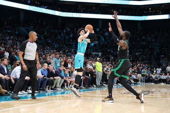 CHARLOTTE, NC - NOVEMBER 20: LaMelo Ball #1 of the Charlotte Hornets shoots a three point basket against the Boston Celtics on November 20, 2023 at Spectrum Center in Charlotte, North Carolina. NOTE TO USER: User expressly acknowledges and agrees that, by downloading and or using this photograph, User is consenting to the terms and conditions of the Getty Images License Agreement.  Mandatory Copyright Notice:  Copyright 2023 NBAE (Photo by Brock Williams-Smith/NBAE via Getty Images)