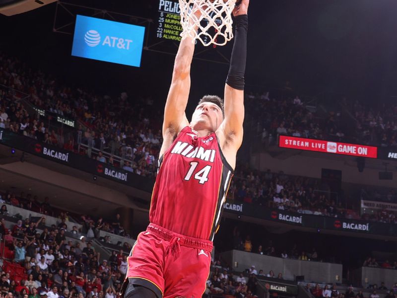 MIAMI, FL - JANUARY 22: Tyler Herro #14 of the Miami Heat drives to the basket during the game against the New Orleans Pelicans on January 22, 2023 at Miami-Dade Arena in Miami, Florida. NOTE TO USER: User expressly acknowledges and agrees that, by downloading and or using this Photograph, user is consenting to the terms and conditions of the Getty Images License Agreement. Mandatory Copyright Notice: Copyright 2023 NBAE (Photo by Nathaniel S. Butler/NBAE via Getty Images)