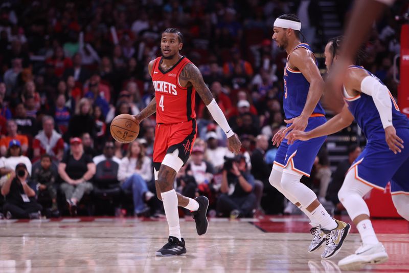 HOUSTON, TX - NOVEMBER 4: Jalen Green #4 of the Houston Rockets dribbles the ball during the game against the New York Knicks on November 4, 2024 at the Toyota Center in Houston, Texas. NOTE TO USER: User expressly acknowledges and agrees that, by downloading and or using this photograph, User is consenting to the terms and conditions of the Getty Images License Agreement. Mandatory Copyright Notice: Copyright 2024 NBAE (Photo by Michael Starghill Jr./NBAE via Getty Images)