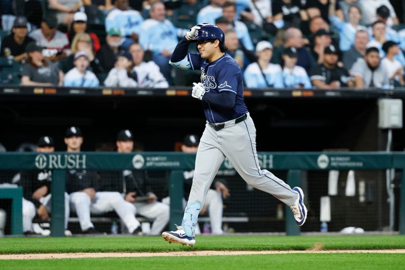 Apr 27, 2024; Chicago, Illinois, USA; Tampa Bay Rays first baseman Austin Shenton (54) rounds the bases after hitting a solo home run against the Chicago White Sox during the fifth inning at Guaranteed Rate Field. Mandatory Credit: Kamil Krzaczynski-USA TODAY Sports