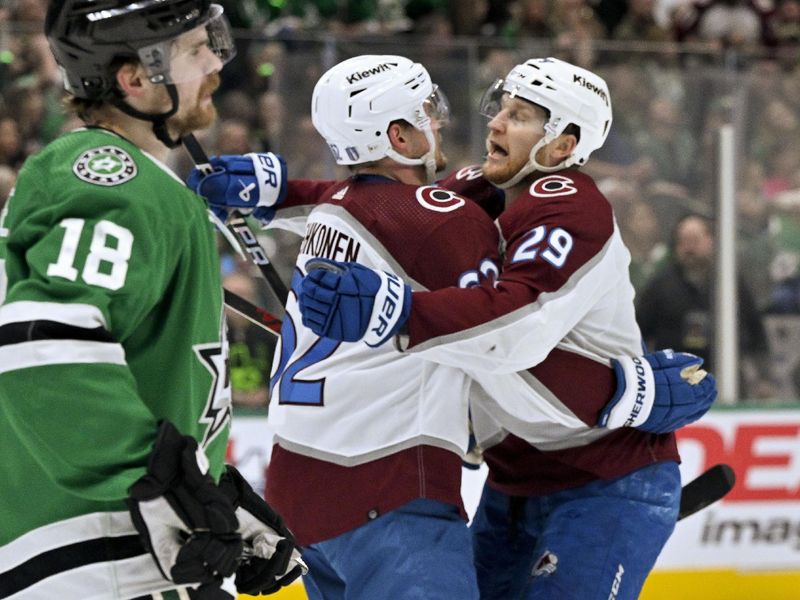 May 15, 2024; Dallas, Texas, USA; Colorado Avalanche left wing Artturi Lehkonen (62) and center Nathan MacKinnon (29) celebrates a power play goal scored by Lehkonen against the Dallas Stars during the first period in game five of the second round of the 2024 Stanley Cup Playoffs at American Airlines Center. Mandatory Credit: Jerome Miron-USA TODAY Sports