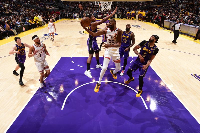 LOS ANGELES, CA - OCTOBER 25: Kevin Durant #35 of the Phoenix Suns shoots the ball during the game against the Los Angeles Lakers on October 25, 2024 at Crypto.Com Arena in Los Angeles, California. NOTE TO USER: User expressly acknowledges and agrees that, by downloading and/or using this Photograph, user is consenting to the terms and conditions of the Getty Images License Agreement. Mandatory Copyright Notice: Copyright 2024 NBAE (Photo by Adam Pantozzi/NBAE via Getty Images)